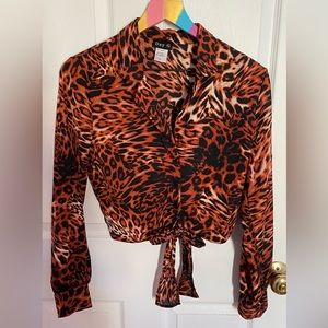 Woman's blouse, S-size with animal Print design, used only once, looks very nice